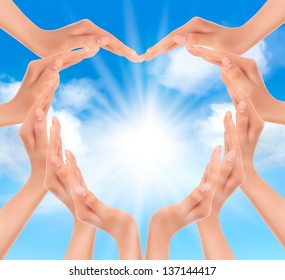 Hands holding the sun. Vector illustration.