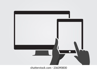 Hands holding tablet computer with blank screen. Tablet computer is connected to secondary display.