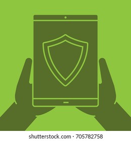 Hands holding tablet computer glyph color icon. Cyber security. Silhouette symbol. Tablet computer with protection shield. Negative space. Vector isolated illustration