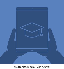Hands holding tablet computer glyph color icon. Educational application. Silhouette symbol. Tablet computer with graduation cap. Negative space. Vector isolated illustration