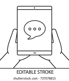 Hands holding tablet computer linear icon. Chatting. Messenger. Thin line illustration. Tablet computer with speech bubble. Contour symbol. Vector isolated outline drawing. Editable stroke