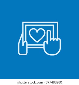 Hands holding tablet with heart sign line icon.
