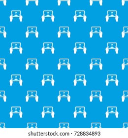 Hands holding tablet pattern repeat seamless in blue color for any design. Vector geometric illustration