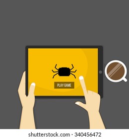 Hands holding tablet, play game