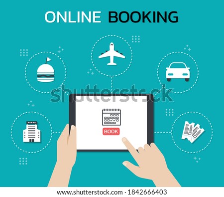 Hands holding a tablet and touch on the screen while use Online booking mobile application, The concept of booking hotels, flights, movie tickets, restaurants and more.
