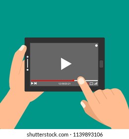 Hands holding tablet and touching screen. Video player on screen. Vector illustration.