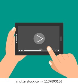 Hands holding tablet and touching screen. Video player on screen. Vector illustration.