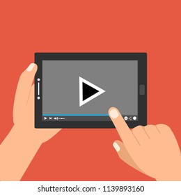 Hands holding tablet and touching screen. Video player on screen. Vector illustration.