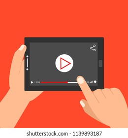 Hands holding tablet and touching screen. Video player on screen. Vector illustration.