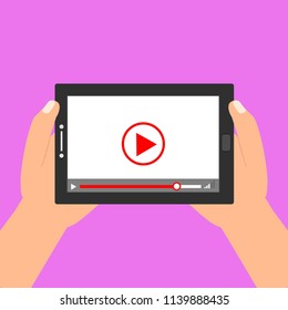 Hands holding tablet with video player on screen. Vector flat illustration