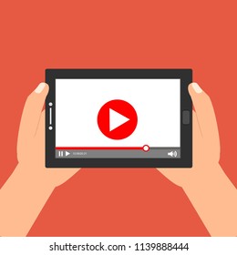 Hands holding tablet with video player on screen. Vector flat illustration