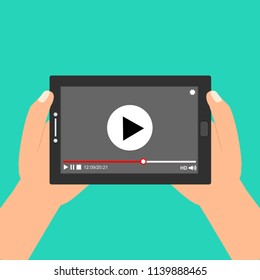 Hands holding tablet with video player on screen. Vector flat illustration