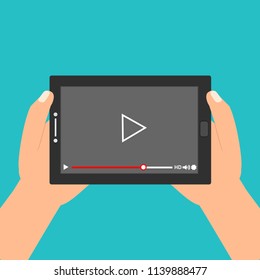 Hands holding tablet with video player on screen. Vector flat illustration