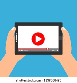 Hands holding tablet with video player on screen. Vector flat illustration