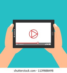 Hands holding tablet with video player on screen. Vector flat illustration