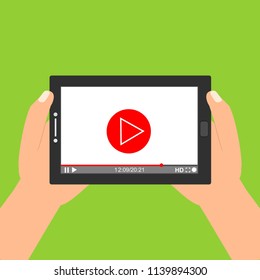 Hands holding tablet with video player on screen. Vector flat illustration