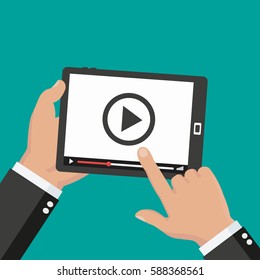 Hands holding tablet with video player on screen. Vector flat illustration. - stock vector