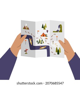 Hands holding trekking and camping map. Flat vector illustration with camping sign and symbols, trekking route, river, forest.