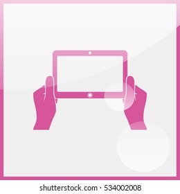 Hands holing tablet computer with blank screen.