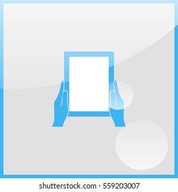 Hands holing tablet computer with blank screen.