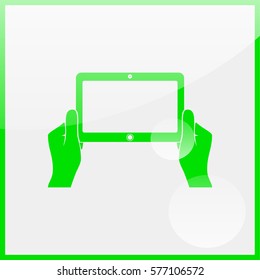 Hands holing tablet computer with blank screen.