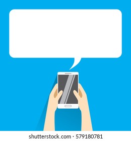 Hands holing white smartphone with blank speech bubble for text. Text messaging flat design concept. 