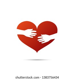 Hands hugging a red heart icon with shadow