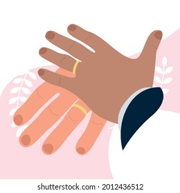 Hands of a husband and wife who trained and put on wedding rings