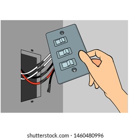 hands installing exposed wired electricity switch
