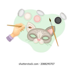 Hands making and painting carnival mask. Top view of creative work process, hobby and craft concept vector illustration