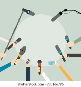 Hands with microphones for interviews or live reports.