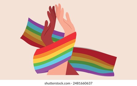 Hands of non-binary couple holding LGBT flag symbolizing love and unity between transgender and gay or lesbian. Pride month concept to promote the idea of tolerance towards LGBT people.