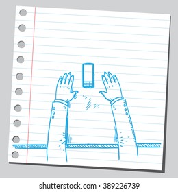 Hands on table with cell phone