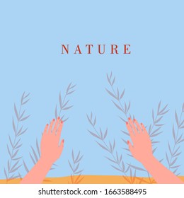 woman’s hands are parting the branches Isolated on blue background.  Place for name of post in the social media. Hands touching something
