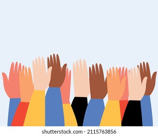 The hands of people of different nationalities are raised up. A crowd of people