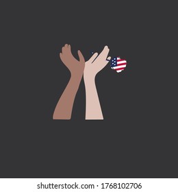 Hands of people of different races touch and hold a rose in the color of the national flag of the United States. Concept of equality, pride in your choice