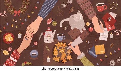 Hands Of People Sitting Around Table And  Preparing For Christmas - Making Festive Decorations, Writing On Greeting Cards, Decorating Cookies. Top View. Colorful Cartoon Holiday Vector Illustration.