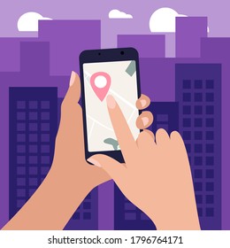 Hands of person holding smartphone with mobile gps navigation on the screen