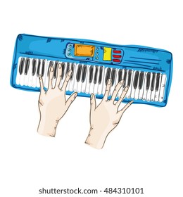 hands playing a piano