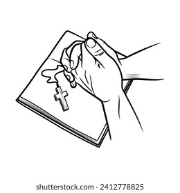 Hands in prayer position on a bible