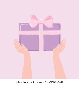 Hands presenting a gift witha ribbon pastel pink purple colors