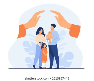 Hands protecting family with two children. Young couple of parents holding baby, standing together under human palms. For family safety, state protection, assistance, care concept