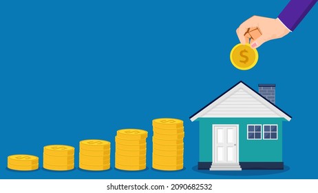 Hands put a pile of coins against the house. Real estate investments and home mortgages