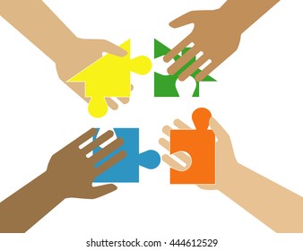 Hands putting puzzle pieces. Teamwork and bussiness concept