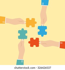 Hands putting puzzle pieces together. Teamwork concept. Flat design