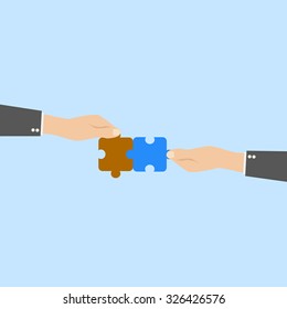 Hands and puzzle. Business concept.