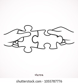 hands with puzzle pieces