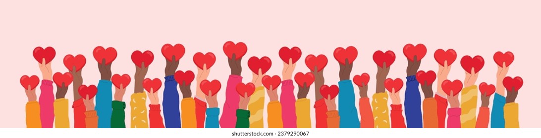 Hands raised up hold hearts, share compassion and hope with those in need. Multinational palms of human hands give support.