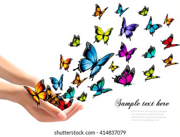 Hands releasing colorful butterflies. Vector illustration