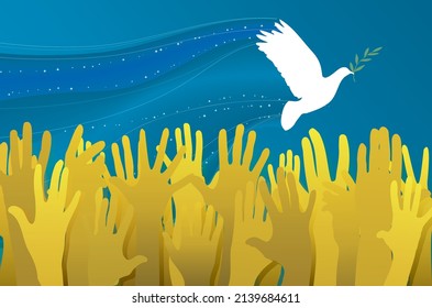 Hands releasing white dove of peace with olive-branch. The symbolic colors of the Ukraine flag.
